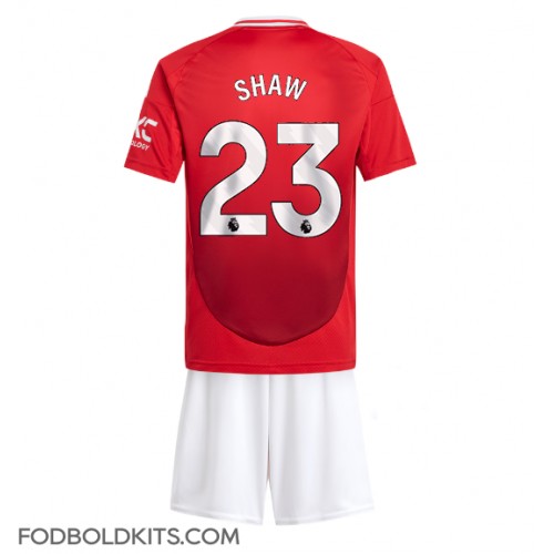 Manchester United Luke Shaw #23 Hjemmebanesæt Børn 2024-25 Kortærmet (+ Korte bukser)